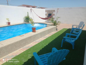 Casa con piscina en General Villamil Playas, acabados de lujo muy confortable